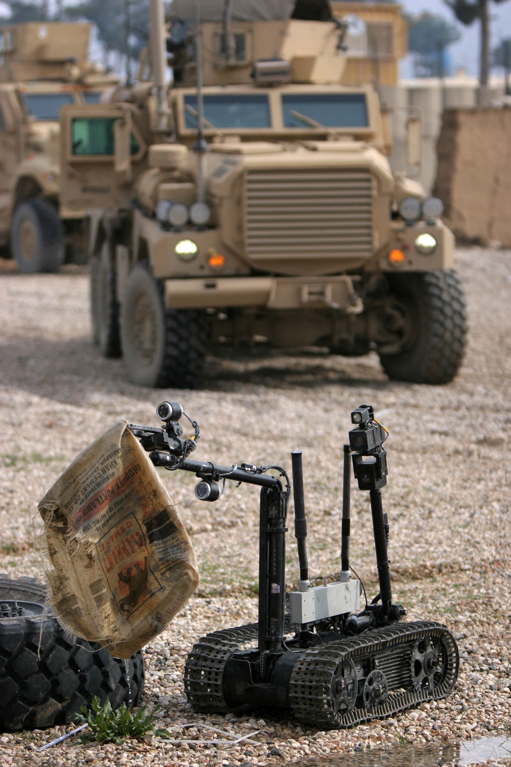 A US Navy EOD robot deomostrates finding a simulated IED