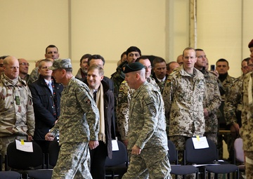 Commander, ISAF US Army Gen. David H. Petraues is escorted by ISAF Regional Command North Deputy Commander U.S. Army Brig. Gen. Sean P. Mulholland before the RC-North change of command ceremony