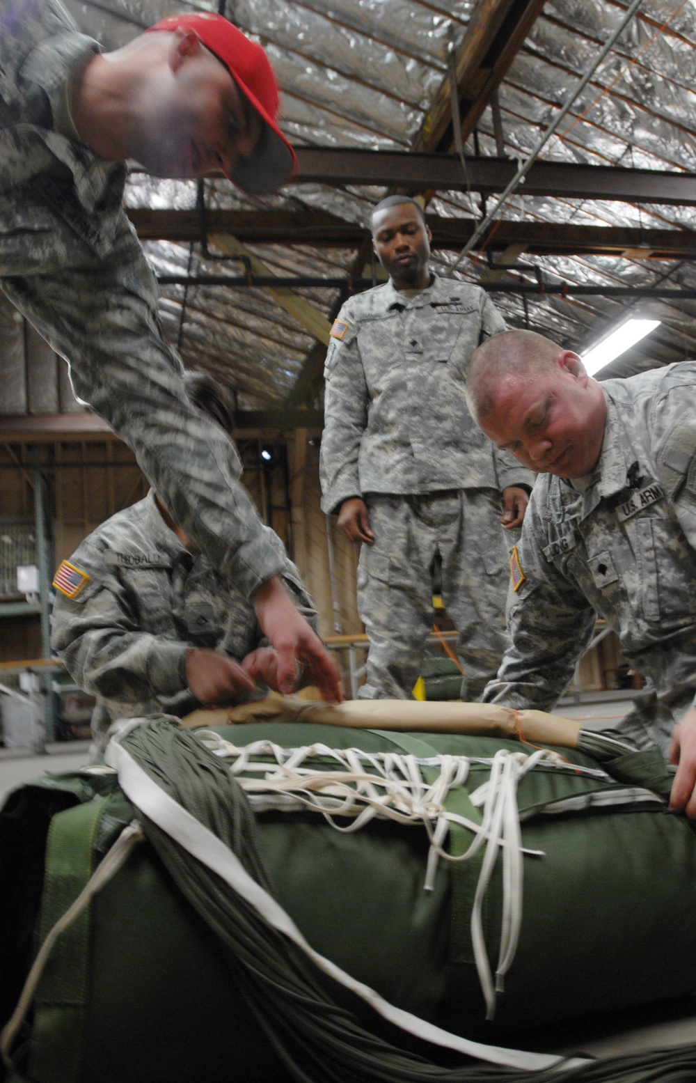 Preparing parachutes for joint operation