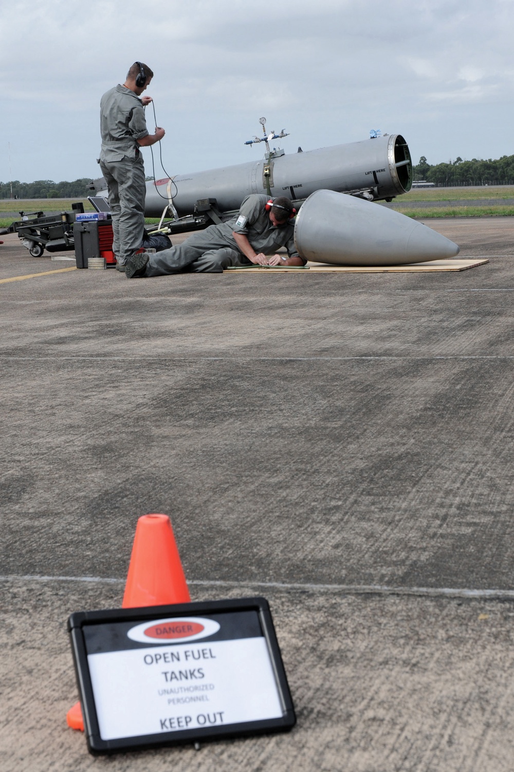 132FW fuel shop members repair F-16 fuel tank during DACT mission in Australia.