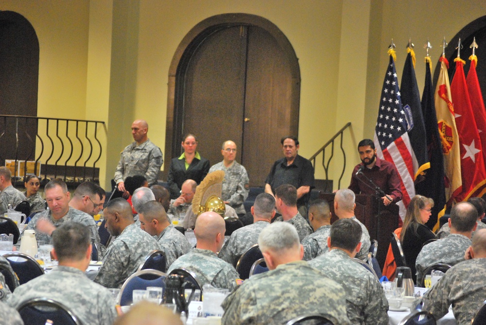 Islamic Community Leader Prays During National Prayer Breakfast at Bragg