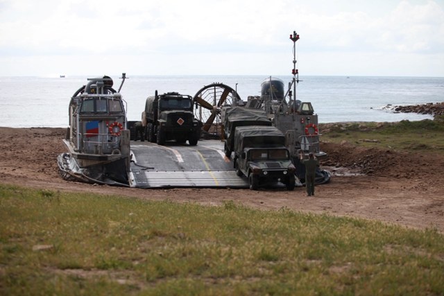 Marines and Tactical Vehicles come ashore