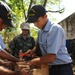 NMCB 28 Sailors Help Build a Classroom Bench