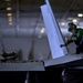 Sailor Performs Maintenance on a F/A-18F Super Hornet