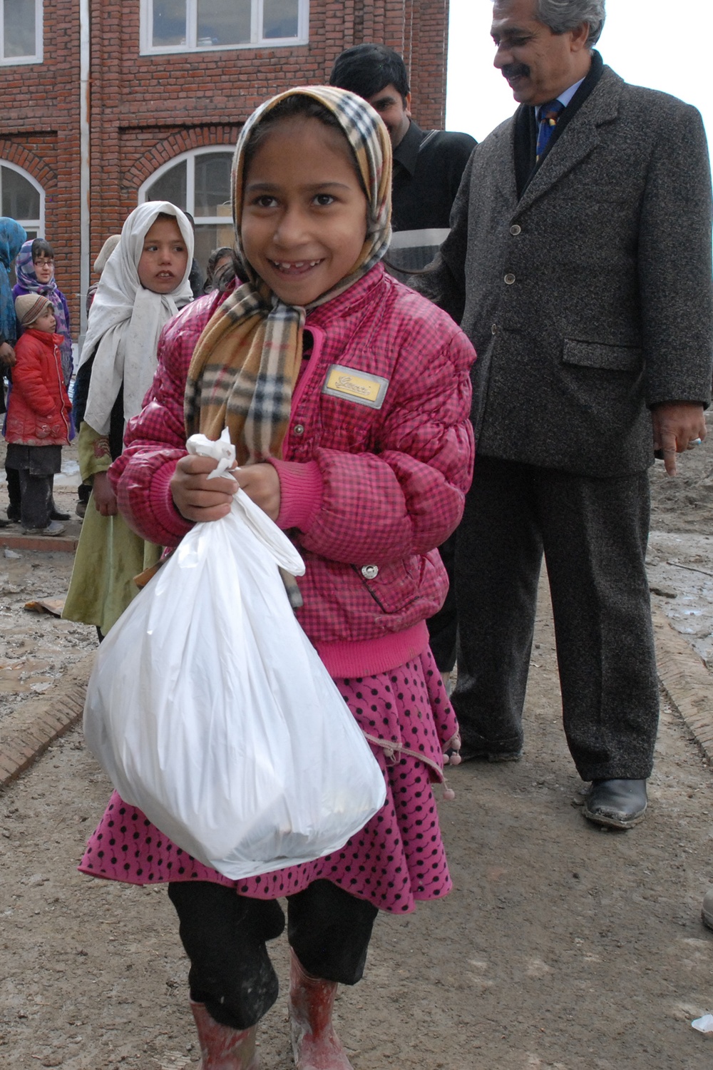 ISAF Chapel delivers supplies to Orphanage