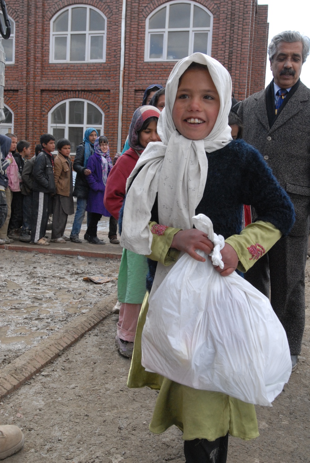 ISAF Chapel delivers supplies to Orphanage