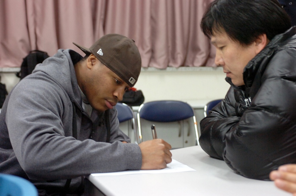 210th Fires soldiers teach Dongducheon citizens English