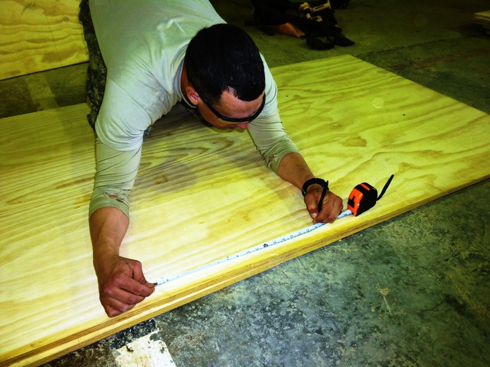 USD-C ‘Venom’ Company soldiers conduct desk refurbishment for local Baghdad school