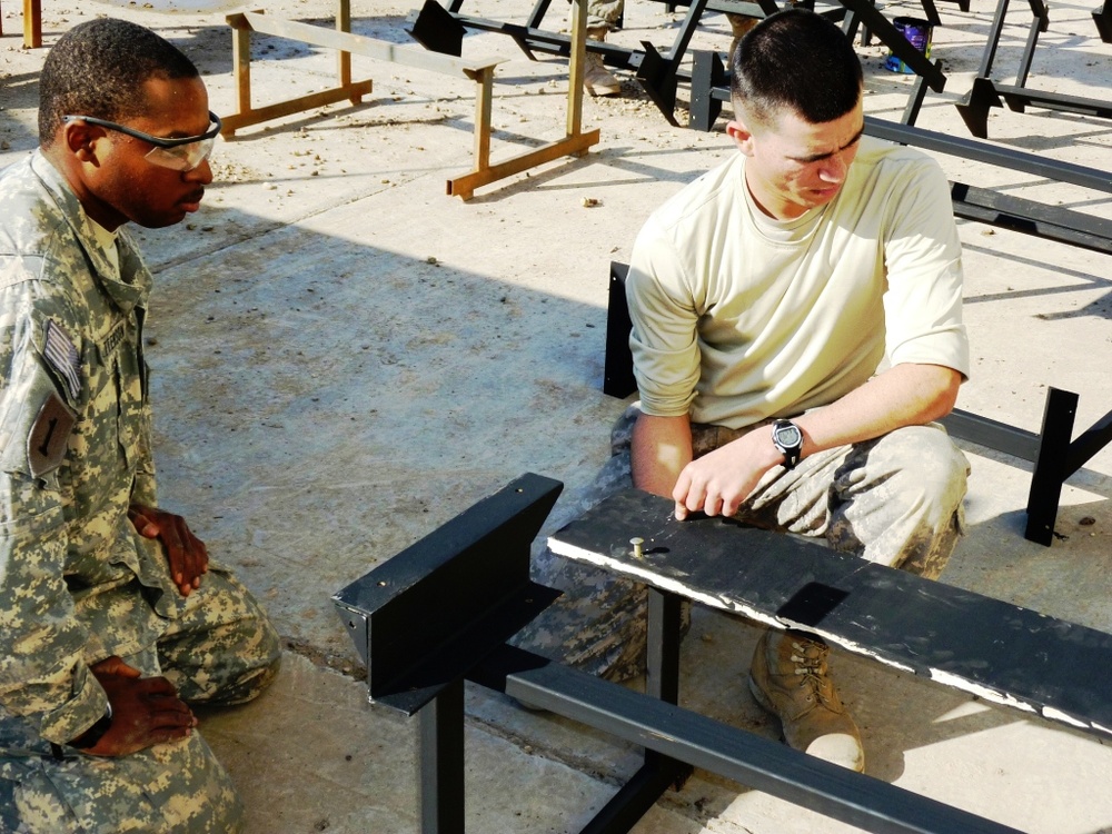 USD-C ‘Venom’ Company soldiers conduct desk refurbishment for local Baghdad school