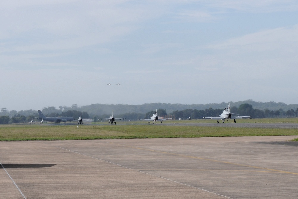 Big bats and fast jets fly together during Dissimilar Air Combat Training mission in Australia.