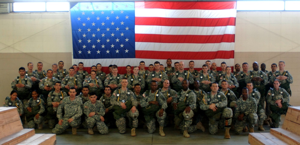 Deputy Commander of XVIII Airborne Corps and Bragg MPs pause for Photo Before Airborne Operation