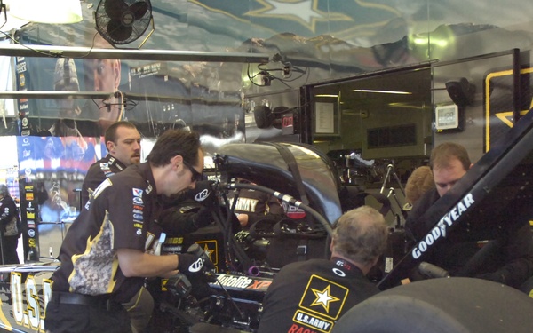 Pit crew works on The Sarge
