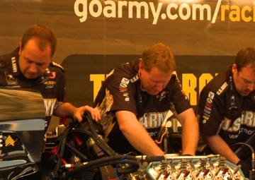 Pit crew works on The Sarge