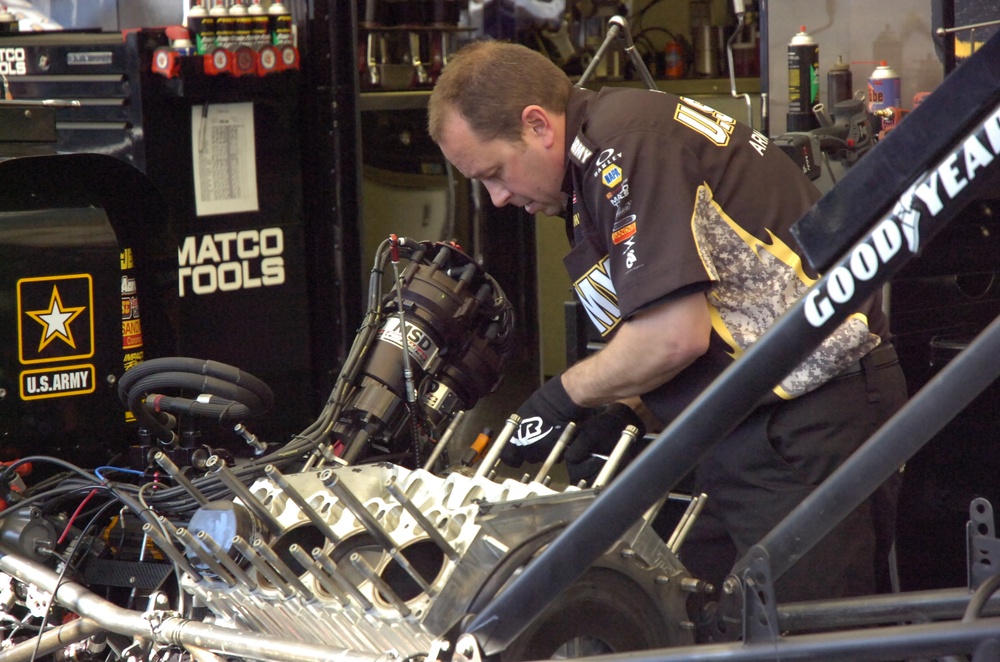 Pit crew works on The Sarge