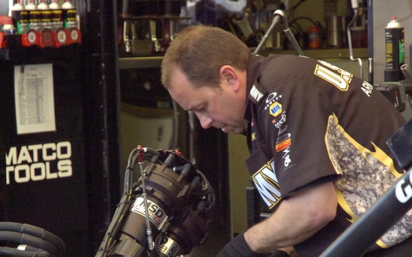 Pit crew works on The Sarge