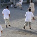 Detainees play soccer in the recreation area of Camp Six at Joint Task Force Guantanamo
