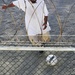 A detainee plays soccer in the recreation area of Camp Six at Joint Task Force Guantanamo