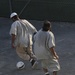 Detainees play soccer in the recreation area of Camp Six