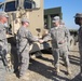 Commanding general gives coins of excellence for outstanding achievement