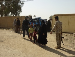 Iraqi Security Forces distribute humanitarian aid in Kadamiyah