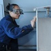 Ronald Reagan sailor conducts maintenance