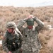 Campbell searches a detainee in the Best Warrior Competition
