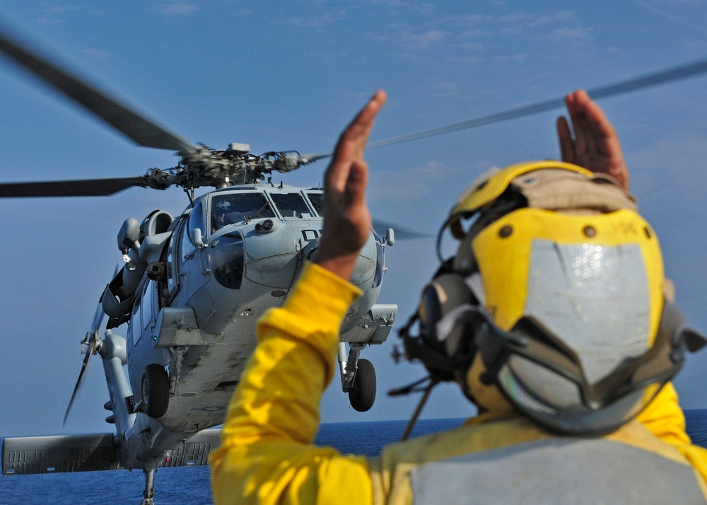 USS Kearsarge and USS Barry vertical replenishment