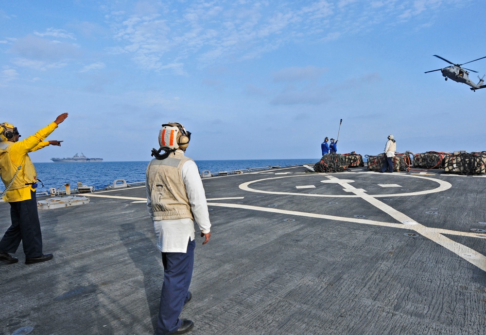 USS Kearsarge and USS Barry vertical replenishment