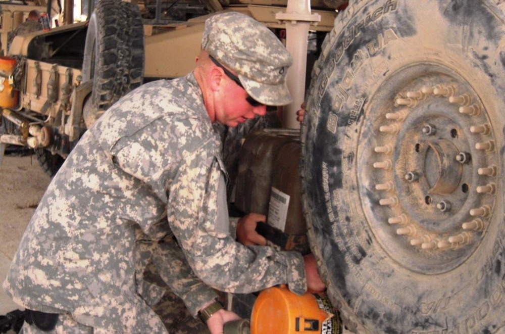 “Saber” Squadron Troopers maintain vehicles in deployed environment