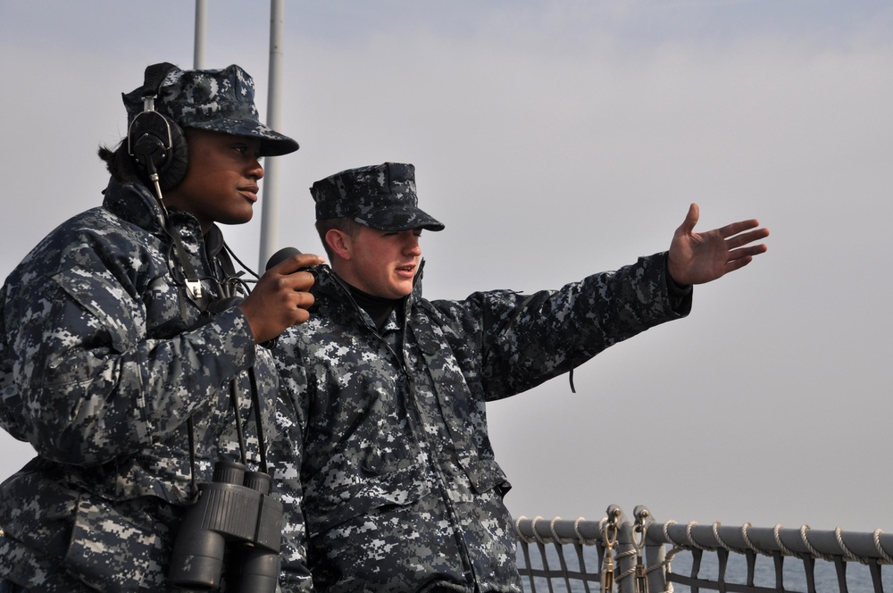USS Tortuga Sailors Stand Watch