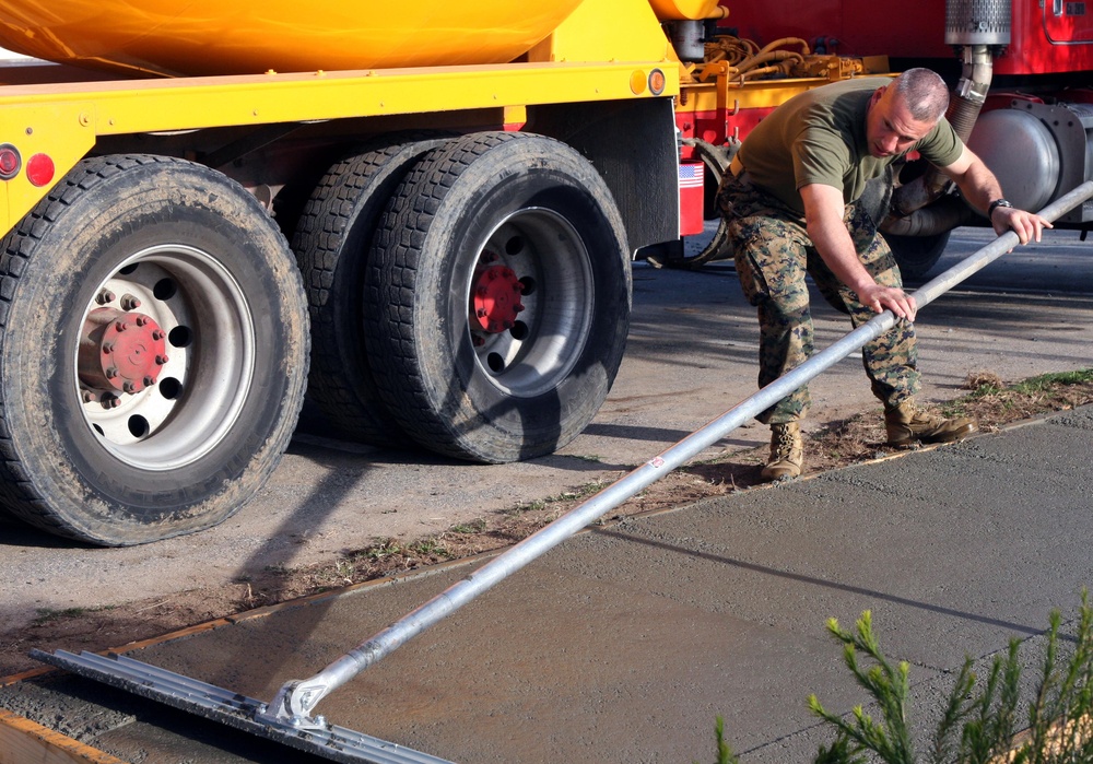 Bull Floating Freshly-Poured Cement