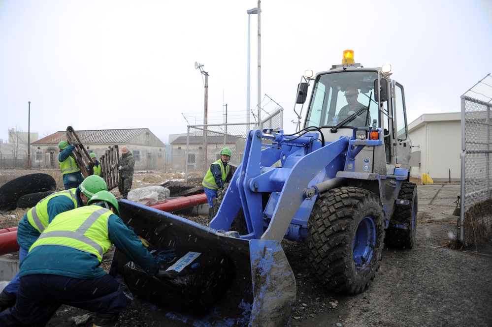 Seabees, JMSDF pitch in to Clean up FISC Yokosuka Defense Fuel Support Point Hachinohe