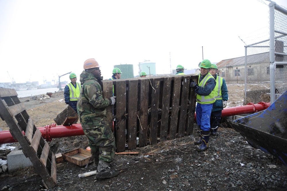 Seabees, JMSDF pitch in to Clean up FISC Yokosuka Defense Fuel Support Point Hachinohe