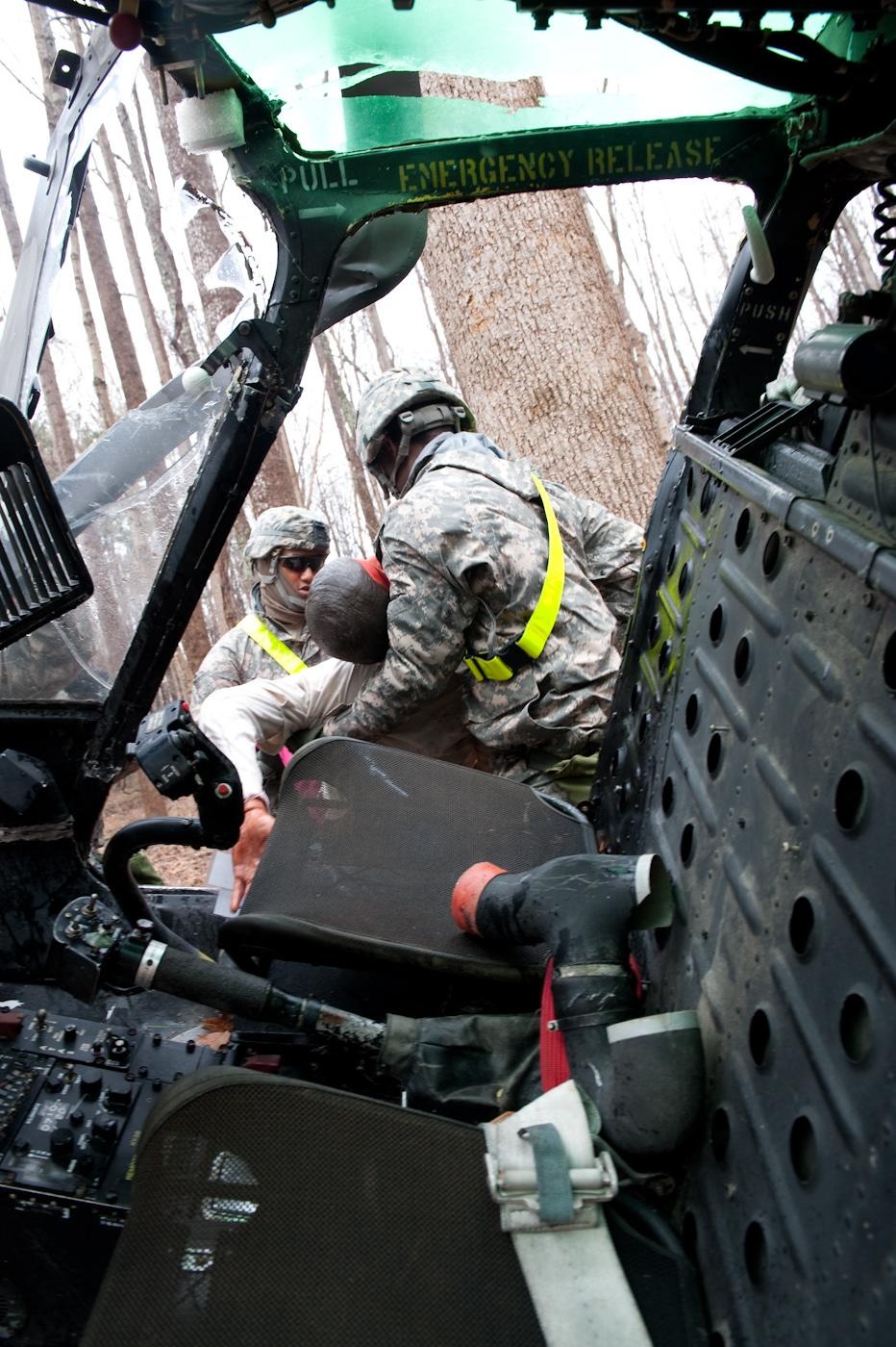 Military Police help simulated casualties during Vibrant Response exercise