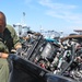 EODESU-1 Sailor Performs Maintenance on a Boat Engine