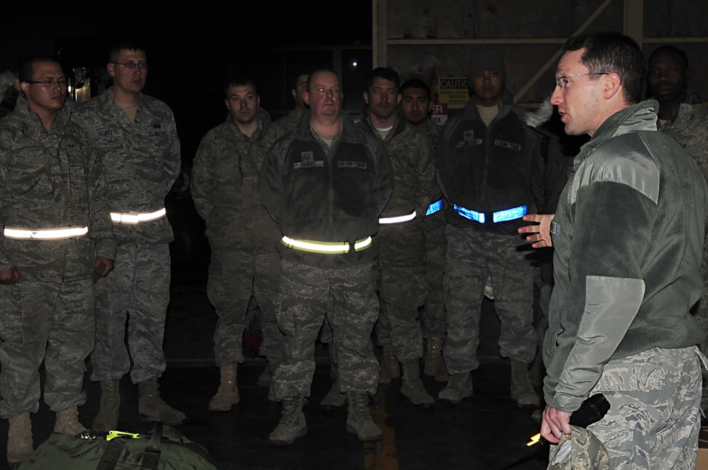 Airmen returns from delivering U.S. AID workers and equipment