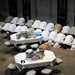 Detainees pray in a communal area of Camp Six at Joint Task Force Guantanamo