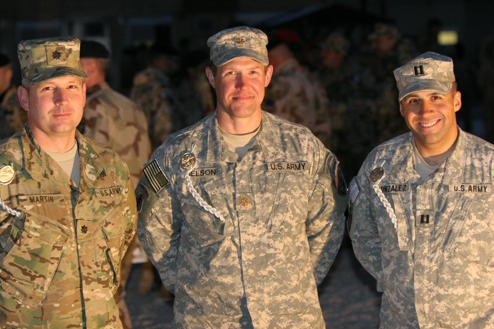 US Soldiers pose for a photo upon receiving a foreign award