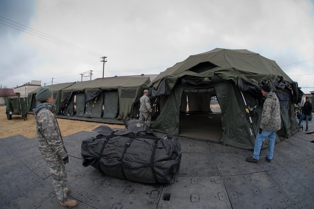 Tents provide additonal workspace at Yokota