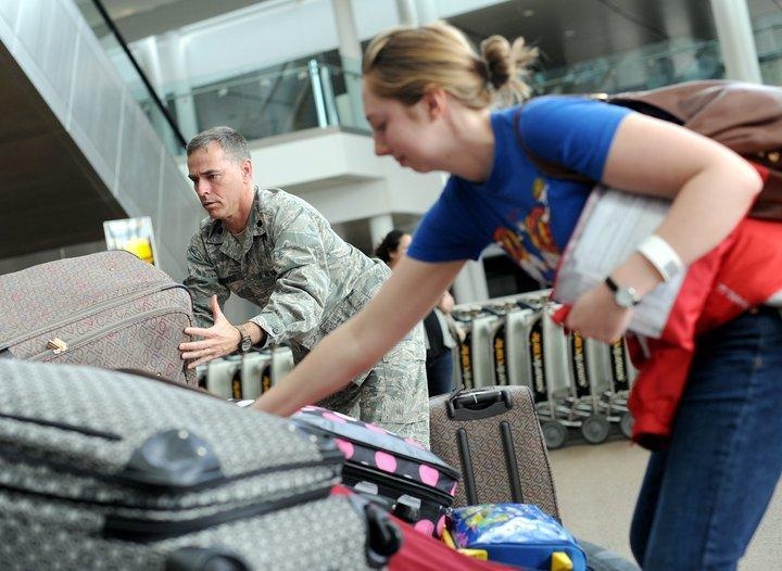 Mobility Airmen among 'joint team' helping returning families with Operation Pacific Passage