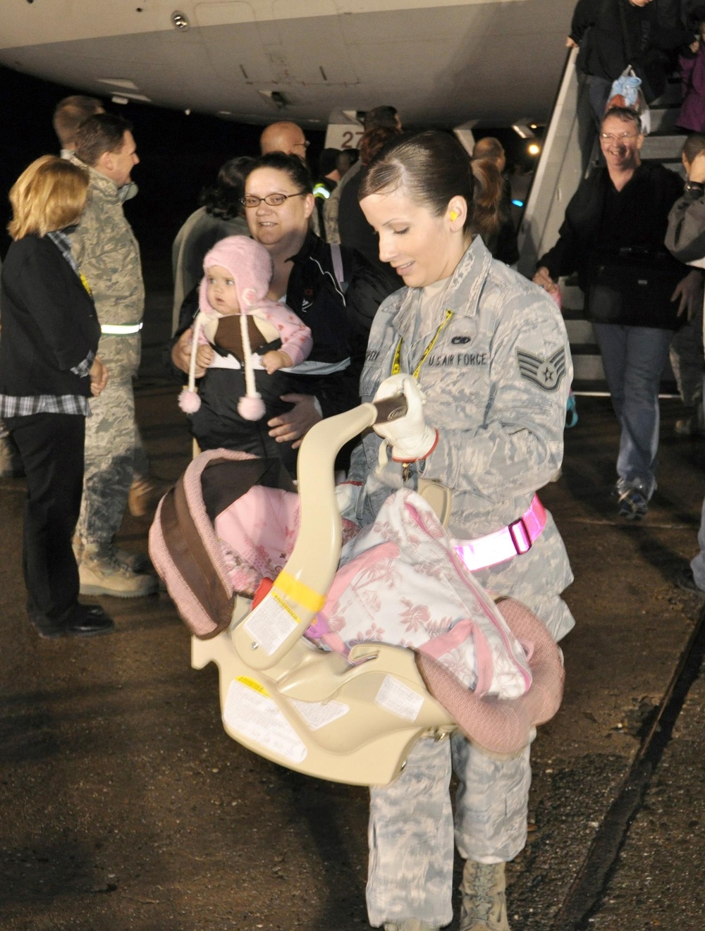 Mobility Airmen among 'joint team' helping returning families with Operation Pacific Passage