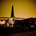 Fuels truck loads on to C-130