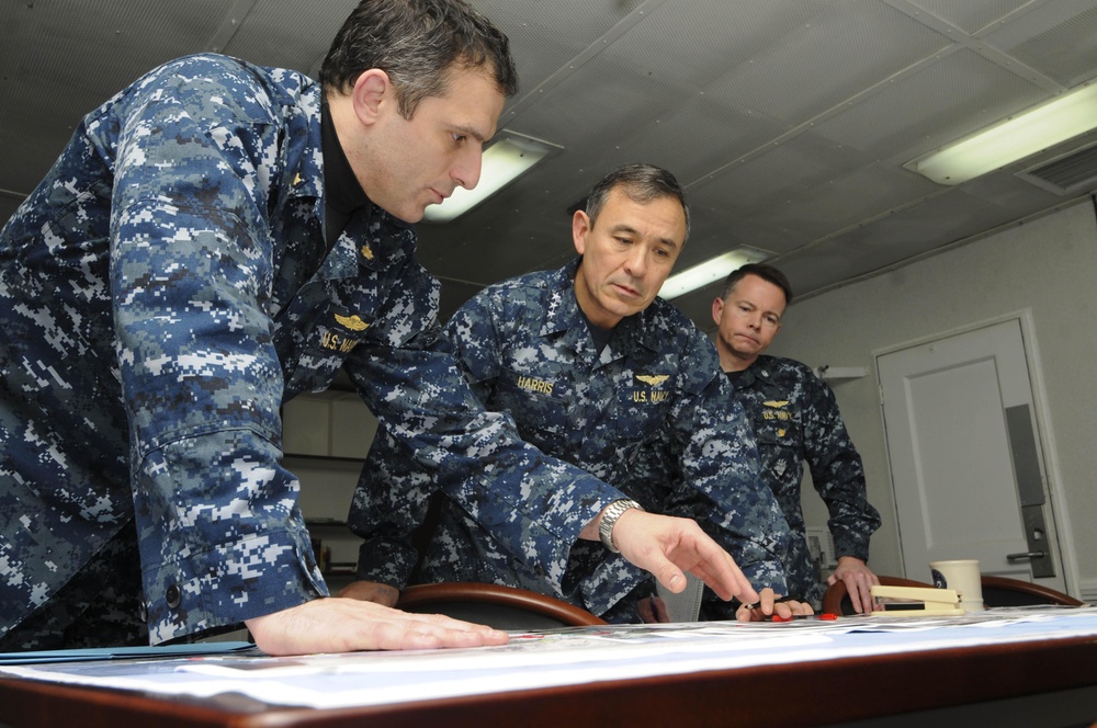 Commander Receives Report During Joint Task Force Odyssey Dawn