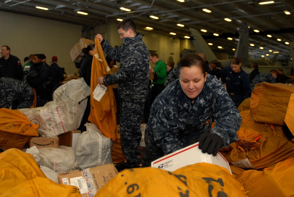 USS Ronald Reagan Sailors Sort Mail