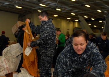 USS Ronald Reagan Sailors Sort Mail