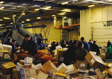 USS Ronald Reagan Sailors Sort Mail