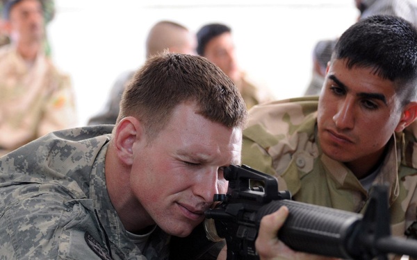 Dropping Dimes: "Golden Dragons" train 12th IA Division Soldiers to use M-16 rifles