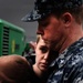 USS Bataan Sailor Comforts Family