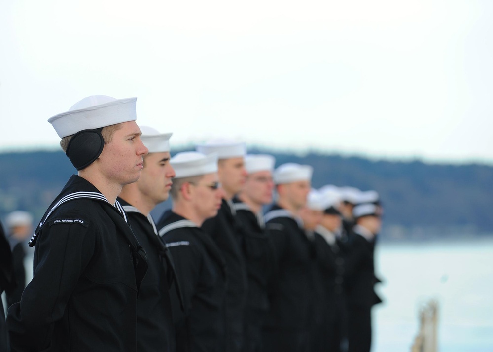 USS Abraham Lincoln Sailors Stand at Parade Rest