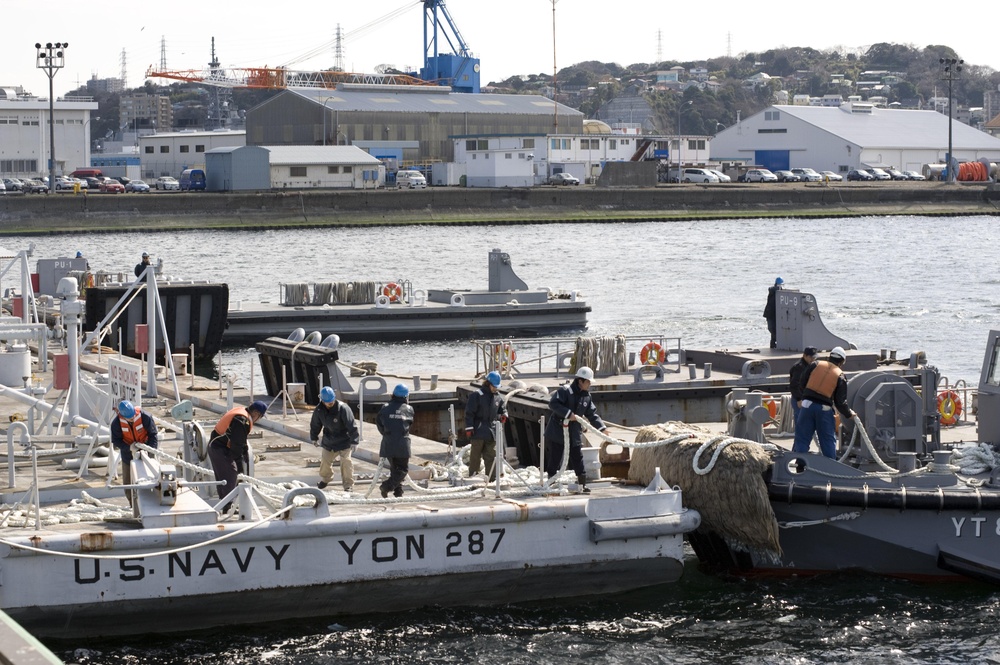 U.S. Navy Barge filled with fresh water, departs Fleet Activities Yokosuka to support cooling efforts at the Fukushima Daiichi nuclear power plant